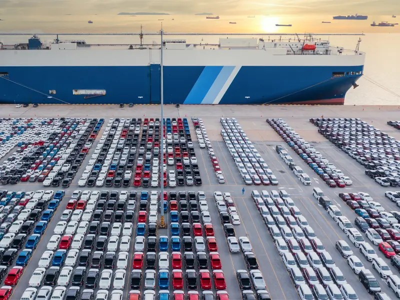 Cars lined up at a post after going through a Finished vehicle logistics